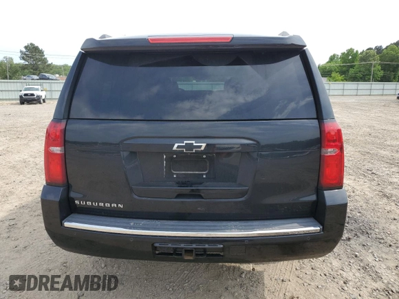 2015 Chevrolet Suburban LTZ with VIN 1GNSKKKC1FR624679, listed as a Copart auction lot 52957365 with 71,194 mi miles and Salvage Title. Bid and sale history available at DreamBid. Image 6.
