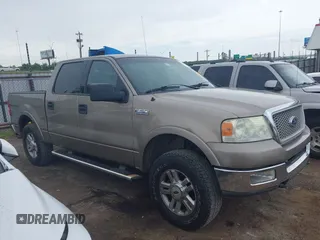2004 Ford F-150 XLT z VIN 1FTPW14554KB11422, wystawiony jako IAAI lot #42651609 z przebiegiem 238 157 mil mil oraz . Historia ofert i sprzedaży dostępna na DreamBid. Obrazek 13.