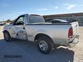 1998 Ford F-150 z VIN 1FTZF1762WKA87421, wystawiony jako Copart lot #86973334 z przebiegiem 217 978 mil mil oraz Szkoda całkowita • Salvage title. Historia ofert i sprzedaży dostępna na DreamBid. Obrazek 2.
