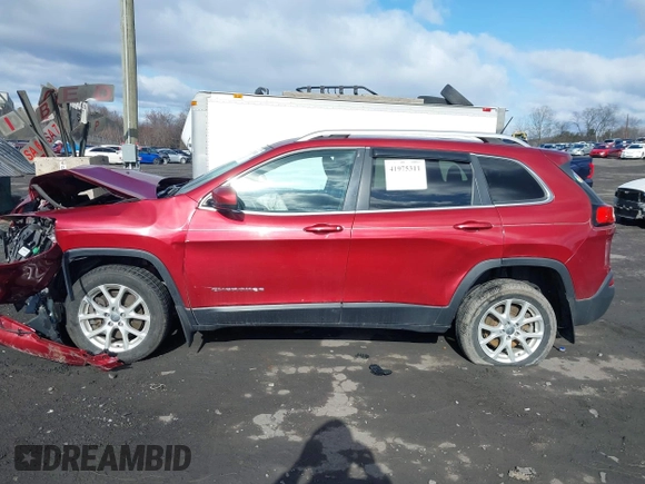 2014 Jeep Cherokee Latitude z VIN 1C4PJMCSXEW141453, wystawiony jako IAAI lot #41975311 z przebiegiem 150 085 mil mil oraz . Historia ofert i sprzedaży dostępna na DreamBid. Obrazek 14.