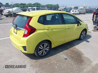 2015 Honda Fit EX-L z VIN 3HGGK5H84FM717976, wystawiony jako IAAI lot #42451573 z przebiegiem 110 963 mil mil oraz . Historia ofert i sprzedaży dostępna na DreamBid. Obrazek 4.