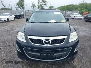 2012 Mazda CX-9 Grand Touring z VIN JM3TB3DV1C0360212, wystawiony jako IAAI lot #42232584 z przebiegiem 99 582 mil mil oraz . Historia ofert i sprzedaży dostępna na DreamBid. Obrazek 12.