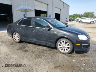 2006 Volkswagen Jetta 2.5L с VIN 3VWRF71K66M799753, выставлен на аукционе Copart как лот 57605525 с пробегом 153 274 миль миль и Списание • Salvage title. История ставок и продаж доступна на DreamBid. Изображение 4.