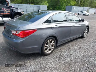 2012 Hyundai Sonata SE z VIN 5NPEC4AC5CH415951, wystawiony jako IAAI lot #42416363 z przebiegiem 205 744 mil mil oraz . Historia ofert i sprzedaży dostępna na DreamBid. Obrazek 4.
