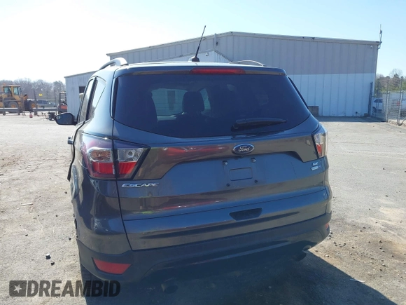 2017 Ford Escape SE with VIN 1FMCU9GD9HUC84906, listed as a IAAI auction lot 41762989 with 147,721 mi miles. Bid and sale history available at carsss.com. Image 16.