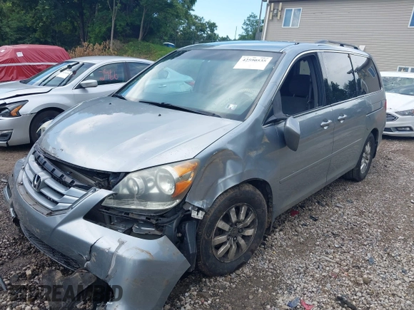 2010 Honda Odyssey EX with VIN 5FNRL3H4XAB015955, listed as a IAAI auction lot 42590535 with Not provided miles and . Bid and sale history available at DreamBid. Image 16.
