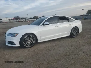 2016 Audi A6 2.0T Premium Plus with VIN WAUDFAFC2GN123428, listed as a Copart auction lot 86282074 with 84,316 mi miles and Salvage Title. Bid and sale history available at carsss.com. Image 1.