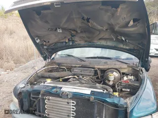 1999 Dodge Ram 1500 with VIN 3B7HC13Z8XG203475, listed as a IAAI auction lot 41487347 with 178,014 mi miles. Bid and sale history available at carsss.com. Image 10.