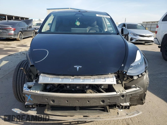 2023 Tesla Model Y Long Range with VIN 7SAYGDEE5PF834645, listed as a Copart auction lot 48596925 with 26,896 mi miles and Salvage Title. Bid and sale history available at DreamBid. Image 5.