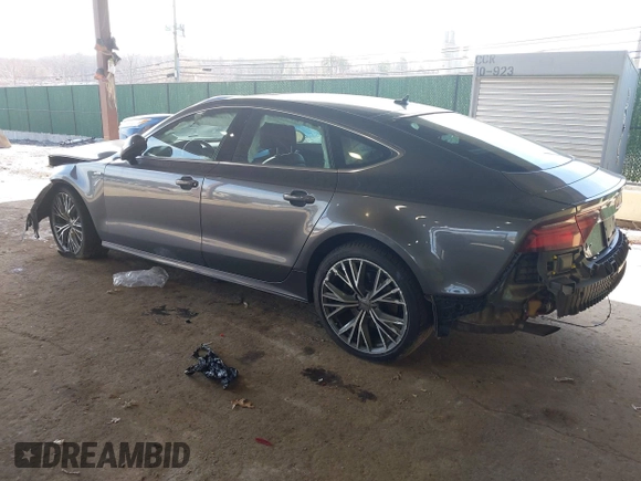 2016 Audi A7 3.0 Prestige with VIN WAU2GAFC5GN197012, listed as a IAAI auction lot 41908607 with 86,084 mi miles. Bid and sale history available at carsss.com. Image 3.