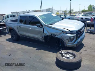 2023 GMC Canyon 2WD Elevation z VIN 1GTP5BEK0P1128555, wystawiony jako IAAI lot #42358779 z przebiegiem 14 220 mil mil oraz . Historia ofert i sprzedaży dostępna na DreamBid. Obrazek 1.