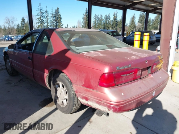1997 Ford Thunderbird LX with VIN 1FALP6247VH138208, listed as a IAAI auction lot 41562980 with 135,204 mi miles and . Bid and sale history available at DreamBid. Image 3.