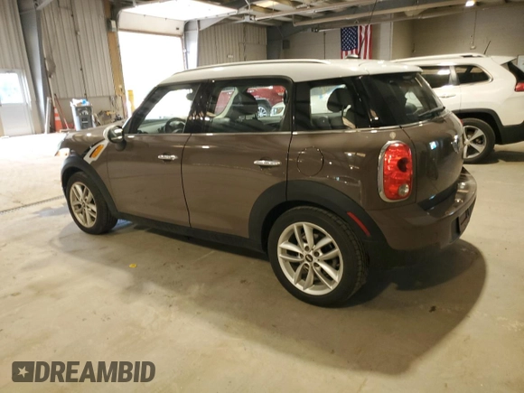 2012 MINI Countryman with VIN WMWZB3C52CWM01672, listed as a Copart auction lot 56064265 with 97,267 mi miles and Salvage Title. Bid and sale history available at DreamBid. Image 2.