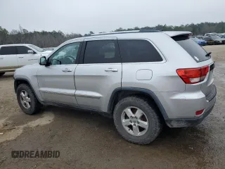 2012 Jeep Grand Cherokee Laredo with VIN 1C4RJFAG2CC294202, listed as a Copart auction lot 44918715 with 104,605 mi miles and Salvage Title. Bid and sale history available at carsss.com. Image 2.