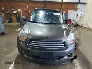 2014 MINI Countryman with VIN WMWZB3C59EWR42124, listed as a Copart auction lot 57830395 with 125,000 mi miles and Salvage title. Bid and sale history available at DreamBid. Image 5.