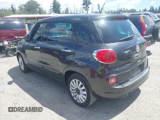 2014 FIAT 500L Easy with VIN ZFBCFABH0EZ028102, listed as a IAAI auction lot 42721149 with 115,137 mi miles and . Bid and sale history available at DreamBid. Image 3.
