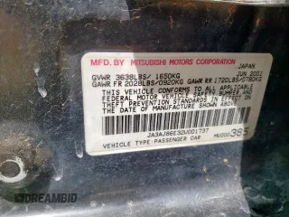 2002 Mitsubishi Lancer OZ-Rally z VIN JA3AJ86E32U001737, wystawiony jako Copart lot #59275695 z przebiegiem 177 332 mil mil oraz Szkoda całkowita • Salvage title. Historia ofert i sprzedaży dostępna na DreamBid. Obrazek 12.