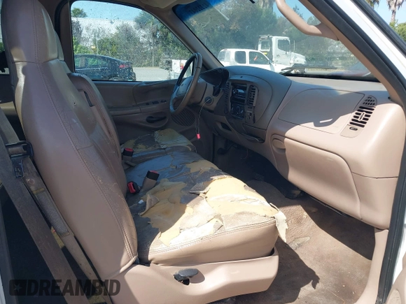 1998 Ford F-150 with VIN 1FTRX18L8WKA86341, listed as a IAAI auction lot 42222043 with 315,734 mi miles and . Bid and sale history available at DreamBid. Image 5.