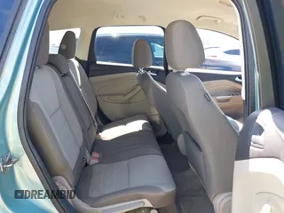 2013 Ford Escape SE with VIN 1FMCU0GX6DUC54374, listed as a IAAI auction lot 42712880 with 140,966 mi miles and . Bid and sale history available at DreamBid. Image 8.