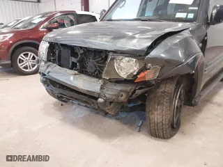 2005 Mitsubishi Montero LTD with VIN JA4MW51S05J000427, listed as a IAAI auction lot 41866896 with 158,494 mi miles. Bid and sale history available at carsss.com. Image 6.