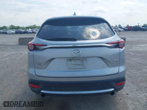 2016 Mazda CX-9 Signature with VIN JM3TCBEY9G0117785, listed as a IAAI auction lot 42331883 with 115,096 mi miles and . Bid and sale history available at DreamBid. Image 16.