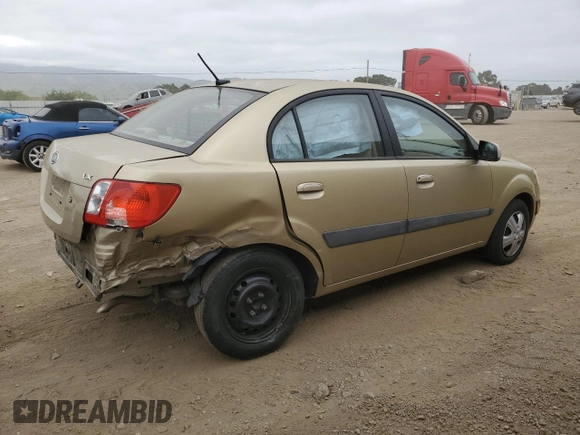 2009 Kia Rio LX with VIN KNADE223496549097, listed as a Copart auction lot 54375975 with 140,882 mi miles and Salvage Title. Bid and sale history available at DreamBid. Image 3.