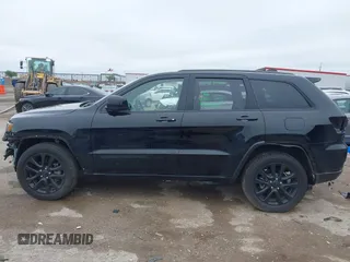 2018 Jeep Grand Cherokee Laredo E with VIN 1C4RJFAG5JC280033, listed as a IAAI auction lot 41953744 with 69,269 mi miles and . Bid and sale history available at DreamBid. Image 15.