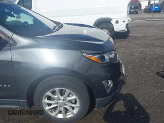 2019 Chevrolet Equinox LS z VIN 2GNAXHEV9K6146286, wystawiony jako IAAI lot #42101137 z przebiegiem 85 098 mil mil oraz . Historia ofert i sprzedaży dostępna na DreamBid. Obrazek 19.