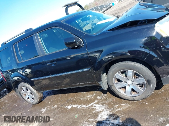 2015 Honda Pilot Touring with VIN 5FNYF3H97FB016390, listed as a IAAI auction lot 41753590 with 217,156 mi miles. Bid and sale history available at carsss.com. Image 13.