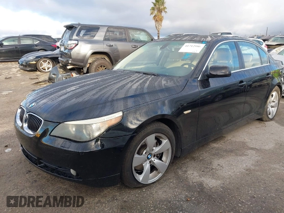 2006 BMW 5 Series 530i with VIN WBANE73506CM42692, listed as a IAAI auction lot 41712986 with 144,501 mi miles and . Bid and sale history available at carsss.com. Image 2.