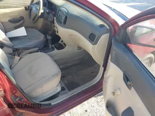 2007 Hyundai Accent GLS with VIN KMHCN46CX7U108664, listed as a IAAI auction lot 41688243 with 188,306 mi miles. Bid and sale history available at carsss.com. Image 5.