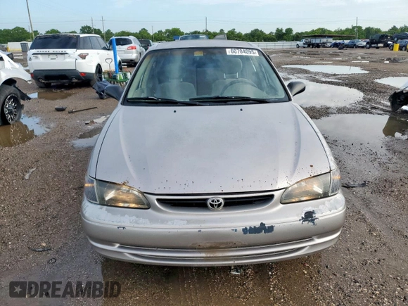 1999 Toyota Corolla VE z VIN 1NXBR12E0XZ215258, wystawiony jako Copart lot #60704095 z przebiegiem Nie podano mil oraz Szkoda całkowita • Salvage title. Historia ofert i sprzedaży dostępna na DreamBid. Obrazek 5.