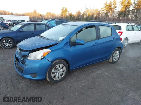 2012 Toyota Yaris L with VIN JTDKTUD37CD539286, listed as a IAAI auction lot 41219674 with 59,292 mi miles. Bid and sale history available at carsss.com. Image 2.