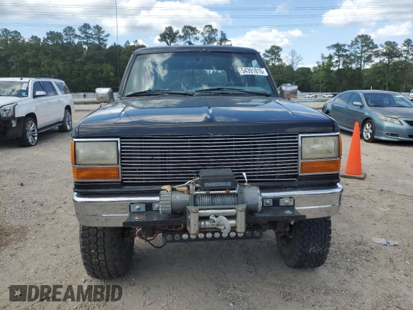 1990 Ford Bronco with VIN 1FMCU14T9LUA15536, listed as a Copart auction lot 54391815 with 319,124 mi miles and Salvage title. Bid and sale history available at DreamBid. Image 5.