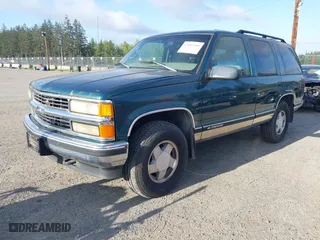 1998 Chevrolet Tahoe with VIN 1GNEK13R9WJ365044, listed as a IAAI auction lot 42042506 with 187,987 mi miles. Bid and sale history available at carsss.com. Image 2.