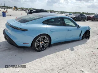 2024 Porsche Taycan z VIN WP0AA2Y17RSA10720, wystawiony jako Copart lot #50988475 z przebiegiem 2 836 mil mil oraz Szkoda całkowita • Salvage title. Historia ofert i sprzedaży dostępna na DreamBid. Obrazek 3.