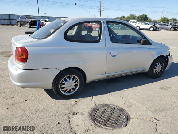 2003 Toyota ECHO with VIN JTDAT123330267128, listed as a Copart auction lot 74781064 with 166,664 mi miles and Salvage Title. Bid and sale history available at carsss.com. Image 3.