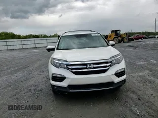 2017 Honda Pilot Touring with VIN 5FNYF6H91HB092062, listed as a Copart auction lot 52761765 with 141,750 mi miles and Salvage Title. Bid and sale history available at DreamBid. Image 12.
