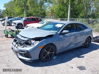 2021 Honda Civic Hatchback Sport with VIN SHHFK7H45MU213228, listed as a IAAI auction lot 41780240 with 58,998 mi miles. Bid and sale history available at carsss.com. Image 17.