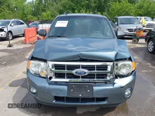 2012 Ford Escape XLT z VIN 1FMCU9DG7CKB91272, wystawiony jako IAAI lot #42168619 z przebiegiem 119 011 mil mil oraz . Historia ofert i sprzedaży dostępna na DreamBid. Obrazek 12.