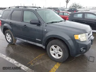 2008 Ford Escape Hybrid with VIN 1FMCU49H68KC32650, listed as a IAAI auction lot 41571371 with 141,424 mi miles. Bid and sale history available at carsss.com. Image 1.