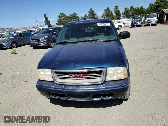 2001 GMC Jimmy SLE Rental Fleet z VIN 1GKDT13W212108144, wystawiony jako Copart lot #58753865 z przebiegiem 254 402 mil mil oraz Szkoda całkowita • Salvage title. Historia ofert i sprzedaży dostępna na DreamBid. Obrazek 14.