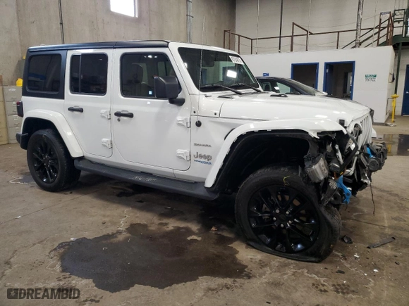 2022 Jeep Wrangler 4xe Unlimited Sahara with VIN 1C4JJXP65NW272312, listed as a Copart auction lot 45154875 with 28,263 mi miles and Salvage Title. Bid and sale history available at carsss.com. Image 4.