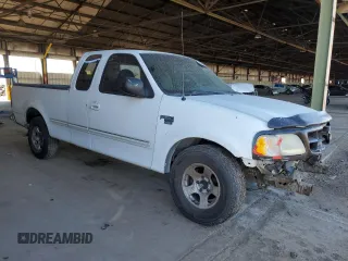 1998 Ford F-150 with VIN 1FTDX176XWNA06879, listed as a Copart auction lot 46032145 with 211,308 mi miles and Salvage title. Bid and sale history available at DreamBid. Image 4.