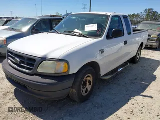 2003 Ford F-150 XL with VIN 1FTRX172X3NA59676, listed as a IAAI auction lot 41821013 with 249,483 mi miles. Bid and sale history available at carsss.com. Image 2.