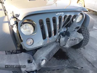 2014 Jeep Wrangler Unlimited Rubicon X with VIN 1C4BJWFG3EL134522, listed as a IAAI auction lot 41221381 with 66,897 mi miles and . Bid and sale history available at DreamBid. Image 6.