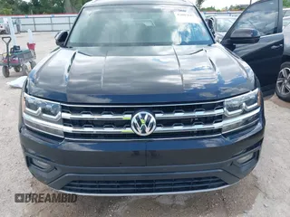2018 Volkswagen Atlas SE z VIN 1V2KR2CA0JC575146, wystawiony jako IAAI lot #42607627 z przebiegiem 104 521 mil mil oraz . Historia ofert i sprzedaży dostępna na DreamBid. Obrazek 6.
