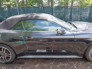 2018 Ford Mustang EcoBoost Premium z VIN 1FATP8UH4J5117856, wystawiony jako IAAI lot #42675106 z przebiegiem 110 587 mil mil oraz . Historia ofert i sprzedaży dostępna na DreamBid. Obrazek 13.