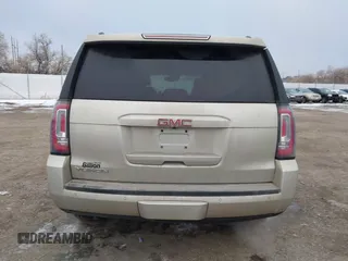 2015 GMC Yukon SLT z VIN 1GKS2BKC6FR655777, wystawiony jako IAAI lot #40982330 z przebiegiem 120 627 mil mil oraz . Historia ofert i sprzedaży dostępna na DreamBid. Obrazek 17.