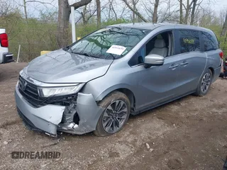2023 Honda Odyssey EX-L with VIN 5FNRL6H63PB020409, listed as a IAAI auction lot 41951039 with 23,008 mi miles. Bid and sale history available at carsss.com. Image 2.